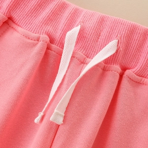 Pantalon de sport rose pour filles avec taille élastique côtelée et cordon de serrage blanc