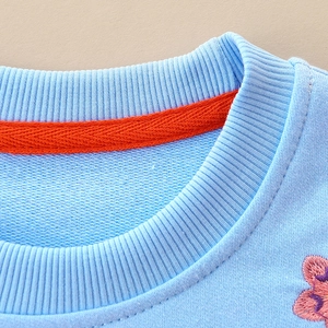 Light blue knit sweatshirt for girls with ribbed collar and orange inner tape detail