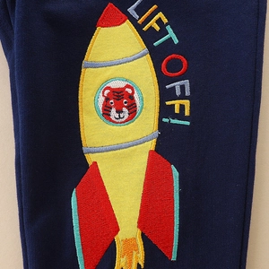 Boys navy joggers with rocket and tiger embroidery patch and Lift Off text detail