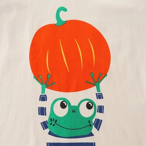 Kids long sleeve t-shirt featuring cute cartoon frog holding a Halloween pumpkin print