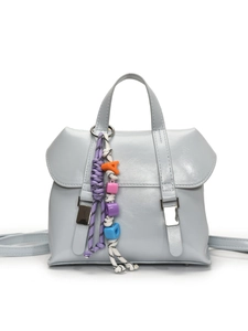Ice blue casual leather backpack with decorative purple knot and letter A pendant