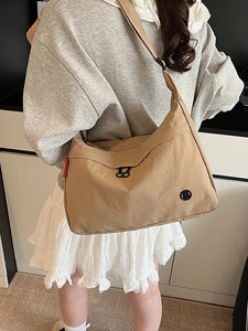 Minimalist large khaki nylon crossbody bag for women's casual travel and daily commute use