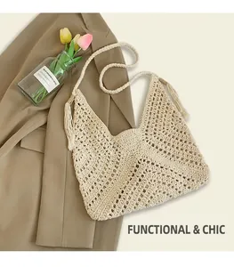 Detail of cream woven tote bag with fringe tassels on beige blazer with tulips