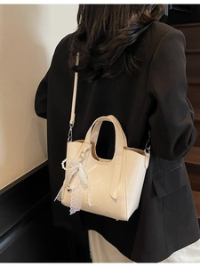 Elegant cream white tote bag with lace pearl bow charm and metal buckle strap for women