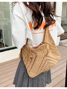 Handcrafted khaki straw tote bag with diamond crochet pattern and drawstring inner pouch