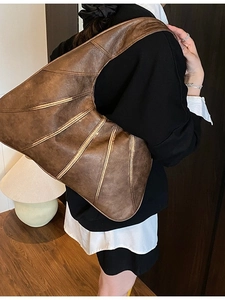 Vintage dark brown faux leather hobo shoulder bag with a curved panel design for women