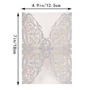 Silver laser cut invitation cover with intricate floral patterns measuring 12.5x18cm