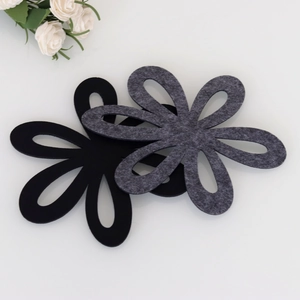 Floral cutout felt heat-resistant coasters in black and dark grey for home table decor