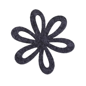 Dark grey felt coaster with hollow six-petal flower design for table heat protection
