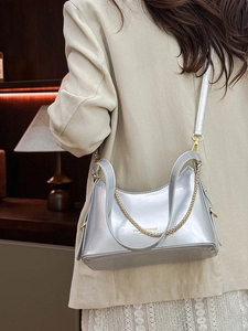 Silver metallic chain bucket bag for women with gold hardware in stylish crossbody style
