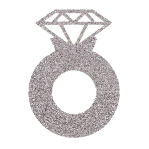 Macro shot of silver glitter diamond ring place cards for wedding party glass decoration