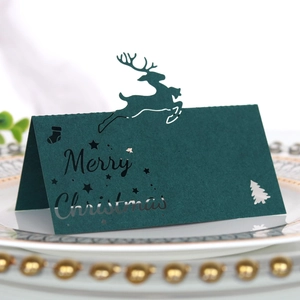 Dunkelgrüne lasergeschnittene Weihnachts-Platzkarte mit Rentier-Motiv und Merry Christmas