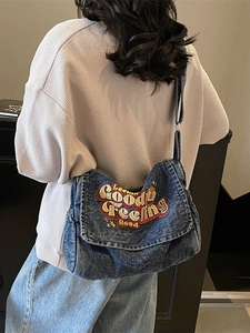 Vintage blue denim tote bag with Good Feeling embroidery and adjustable shoulder strap