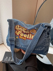 Retro denim tote bag with colorful embroidery and wide adjustable shoulder strap