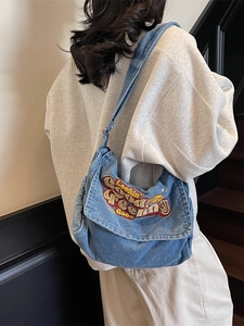 Retro light blue denim tote bag with Looking Feeling Good embroidery for casual daily wear