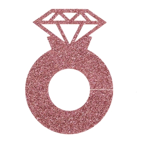 Detail of a pink glitter diamond ring cutout ornament for party decoration and seating cards