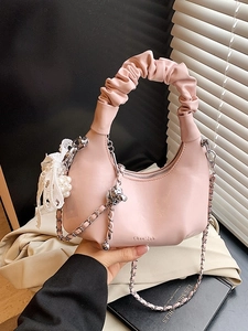 Pink pleated crescent handbag with chain strap and butterfly charms for women