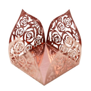 Laser-cut rose gold mirror paper favor box with intricate hollow floral patterns