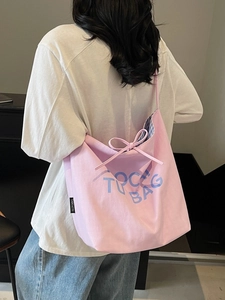 Sac fourre-tout en toile rose avec texte artistique bleu et doublure à carreaux chic
