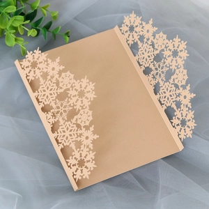 Close-up of laser-cut snowflake hollow card cover made of premium pearlescent paper
