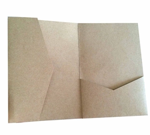 Detail of laser cut kraft paper wedding invitation holder with dual internal pockets