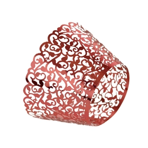 Macro shot of laser-cut red mirror finish cupcake wrappers with elegant filigree patterns