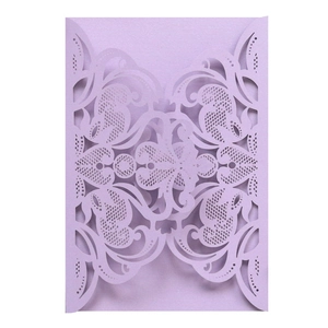 Elegant laser-cut purple lace invitation cover with floral patterns for weddings