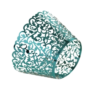 Detail of laser-cut vine patterns on cyan blue metallic cupcake wrappers for party decor