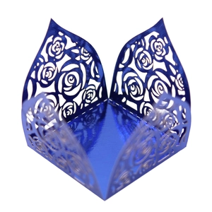 Detailed laser-cut rose pattern on dark blue metallic wedding candy paper box
