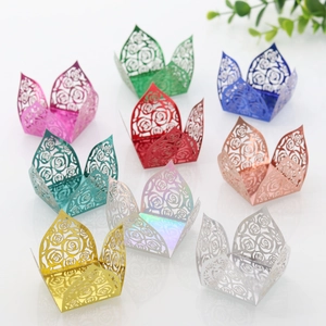 Detailed laser-cut hollow rose pattern candy boxes in various metallic vibrant colors