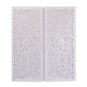Elegant white laser-cut wedding invitation featuring rose and leaf patterns on a white background