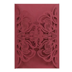 Elegant red laser-cut lace wedding invitation cover with ornate floral hollow pattern