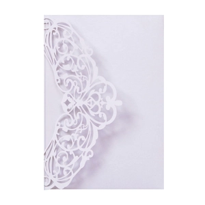 Intricate laser-cut floral pattern on light purple pearlescent paper wedding card