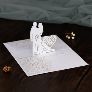 Detailed laser-cut 3D wedding card with Mr & Mrs silhouette and intricate patterns