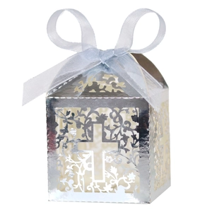 Silver laser cut wedding favor box with cross design and light blue satin ribbon bow