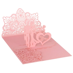 Pink 3D laser cut wedding invitation card featuring Mr & Mrs heart silhouette design