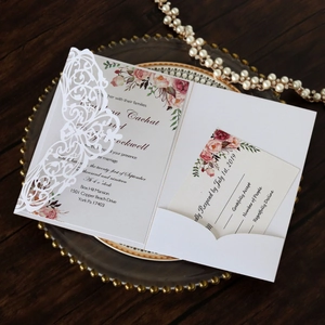 Exquisite laser cut lace wedding invitation set with floral card on luxury tray