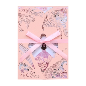 Pink laser-cut wedding invitation with romantic couple silhouette and silk ribbon bow