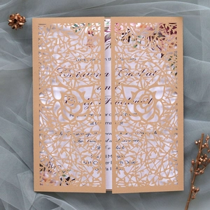 Intricate laser-cut rose hollow invitation cover with elegant floral printed inner sheet