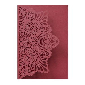Laser-cut burgundy wedding invitation card with intricate mandala hollow pattern details