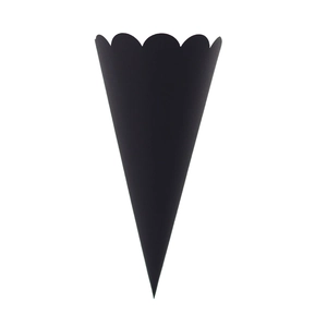 Close-up of matte black cone paper holder with elegant scalloped petal edges for weddings
