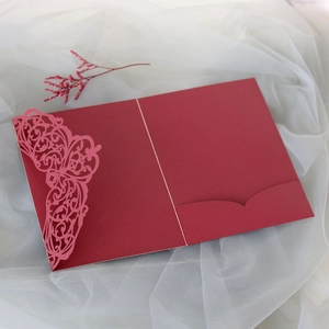 Detailed laser-cut butterfly cutout on high-quality wine red wedding invitation card