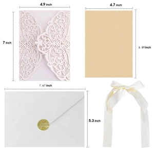 Laser cut floral wedding invitation set with pearlescent insert and ribbon detail
