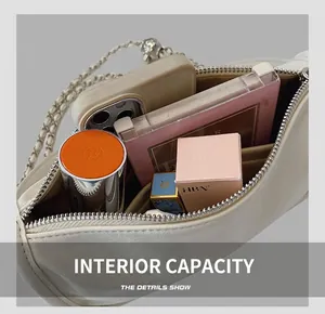 Top view of cream pillow bag interior showing space for phone, lipstick, and cosmetics