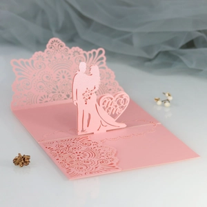 Pink laser-cut 3D pop-up wedding invitation card with Mr & Mrs silhouette and heart pattern