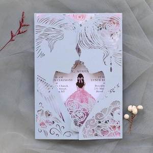 Laser cut wedding invitation with romantic bride and groom silhouette and rose details