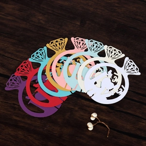 Detailed laser-cut diamond ring paper cards with couple silhouette in multiple vibrant colors