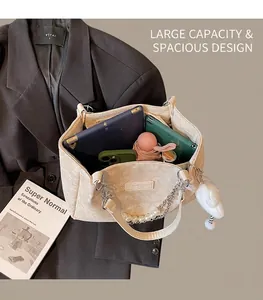 Top view of cream white tote bag interior showing large capacity for tablet and daily items