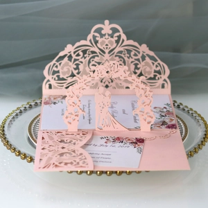 Elegant 3D laser-cut wedding invitation set in pink with floral inner card and pop-up art