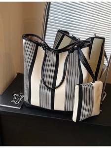 Large capacity black and white striped canvas tote bag with black leather trim and small pouch